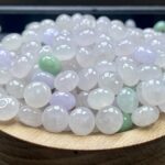 A57K 卡9*6mm 天然缅甸翡翠A货散珠浅冰紫绿鼓珠 22.5$ 一颗 · 白色
