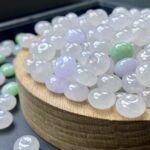 A57K 卡9*6mm 天然缅甸翡翠A货散珠浅冰紫绿鼓珠 22.5$ 一颗 · 白色 - Image 4